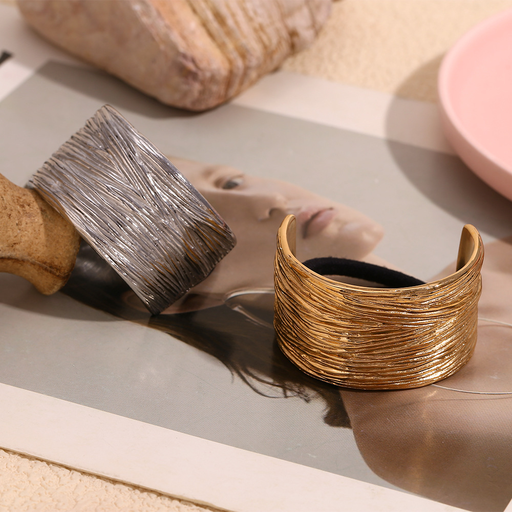 Elegant and unique creative hair tie, stainless steel, 18K gold plated, wide, irregular, finely textured, semi-circular hair tie