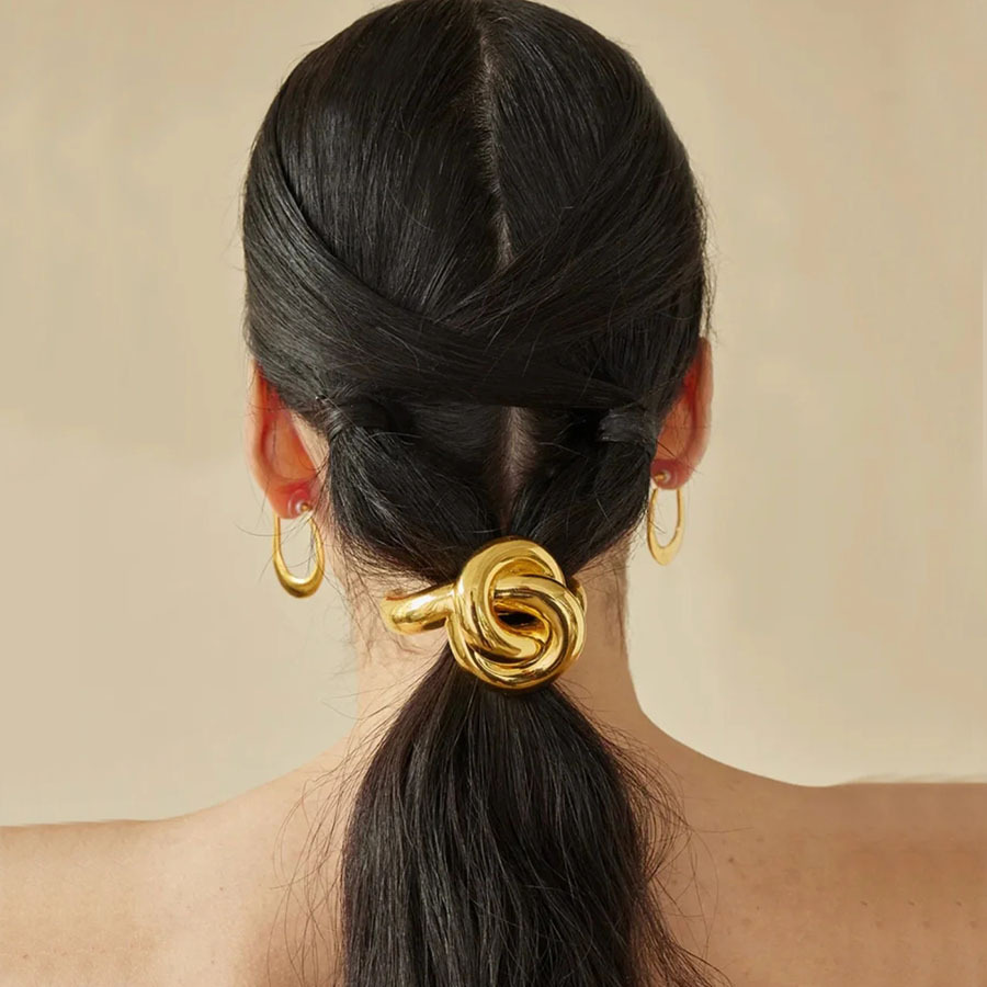 Designer metal hair tie with knot, simple and versatile hair band for women to tie ponytails and buns.