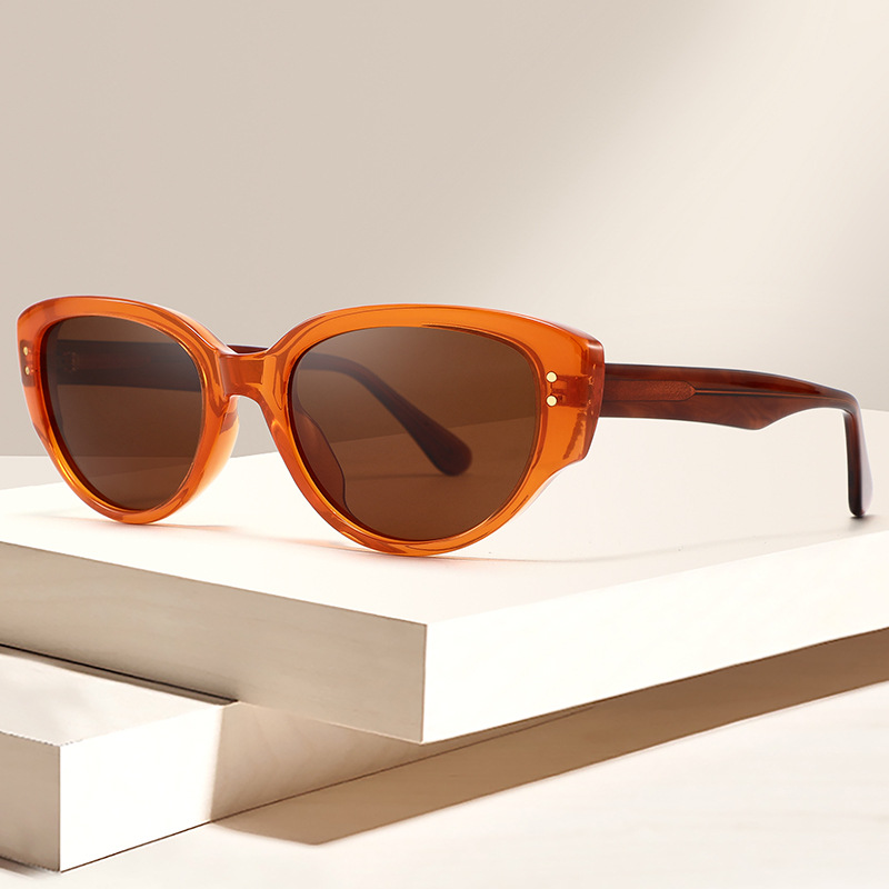 Women's stylish cat-eye sunglasses, TR90 frame, acetate temples, perfect for travel, UV protection.