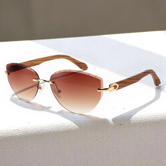 Frameless sunglasses, stylish cat-eye design, lenses cut with wood-paneled temples.