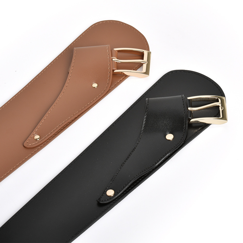 A stylish women's belt that can be worn in various ways – a leather belt with a narrow waistband that can be draped diagonally over a coat with a wide waistband.