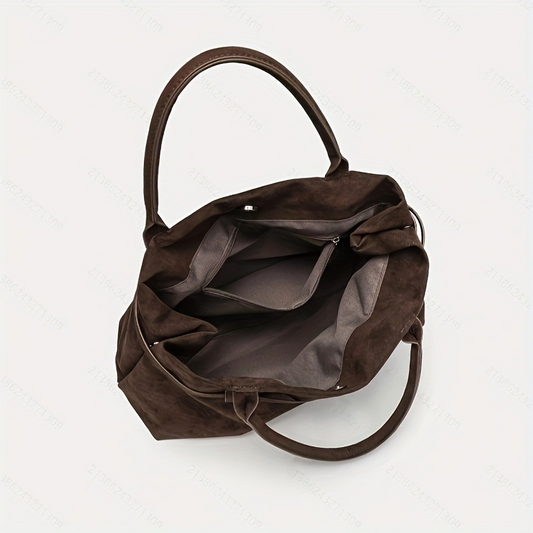 Retro suede handbag with a casual, lazy look – perfect for women who commute. Made of suede.