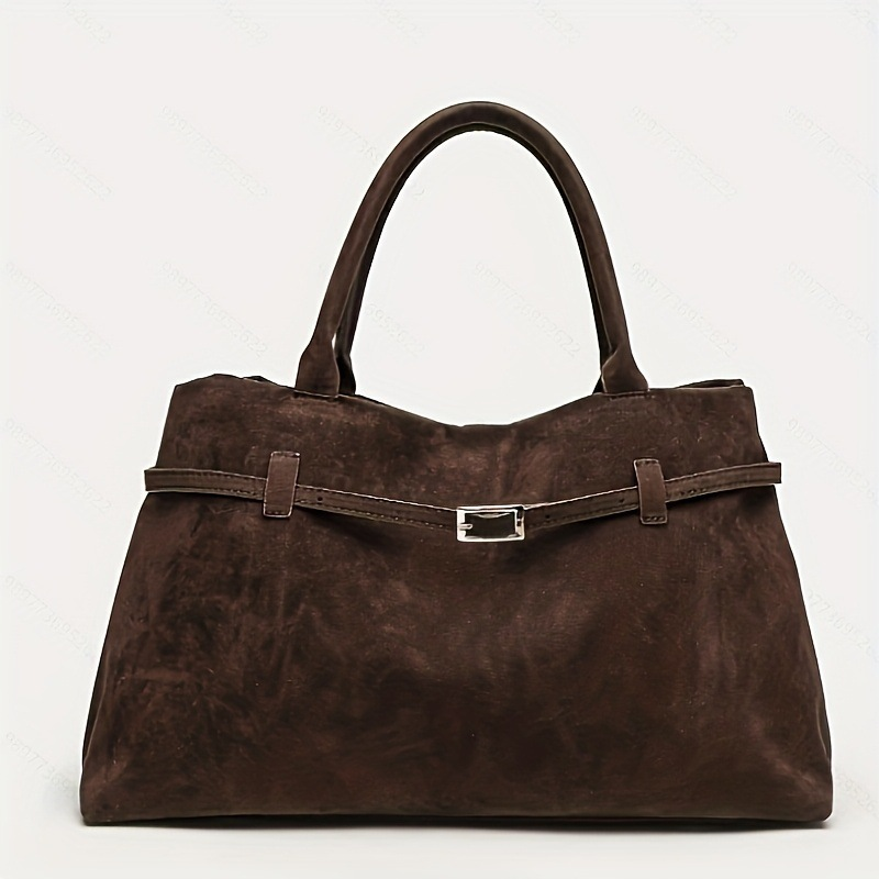 Retro suede handbag with a casual, lazy look – perfect for women who commute. Made of suede.