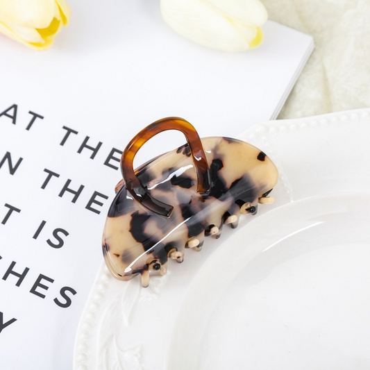 High-end acetate hair clip, shark clip at the back of a woman's head