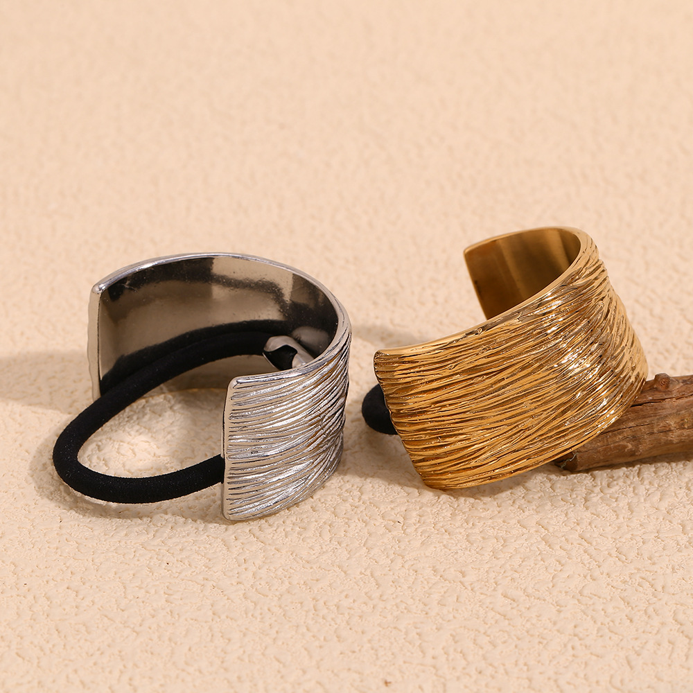 Elegant and unique creative hair tie, stainless steel, 18K gold plated, wide, irregular, finely textured, semi-circular hair tie