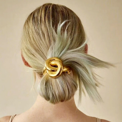 Designer metal hair tie with knot, simple and versatile hair band for women to tie ponytails and buns.
