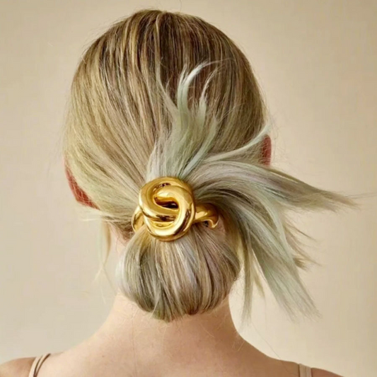 Designer metal hair tie with knot, simple and versatile hair band for women to tie ponytails and buns.