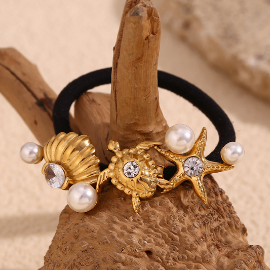 Trendy, niche design, popular and versatile stainless steel hair tie with 18K gold plating, featuring marine animal designs for women.