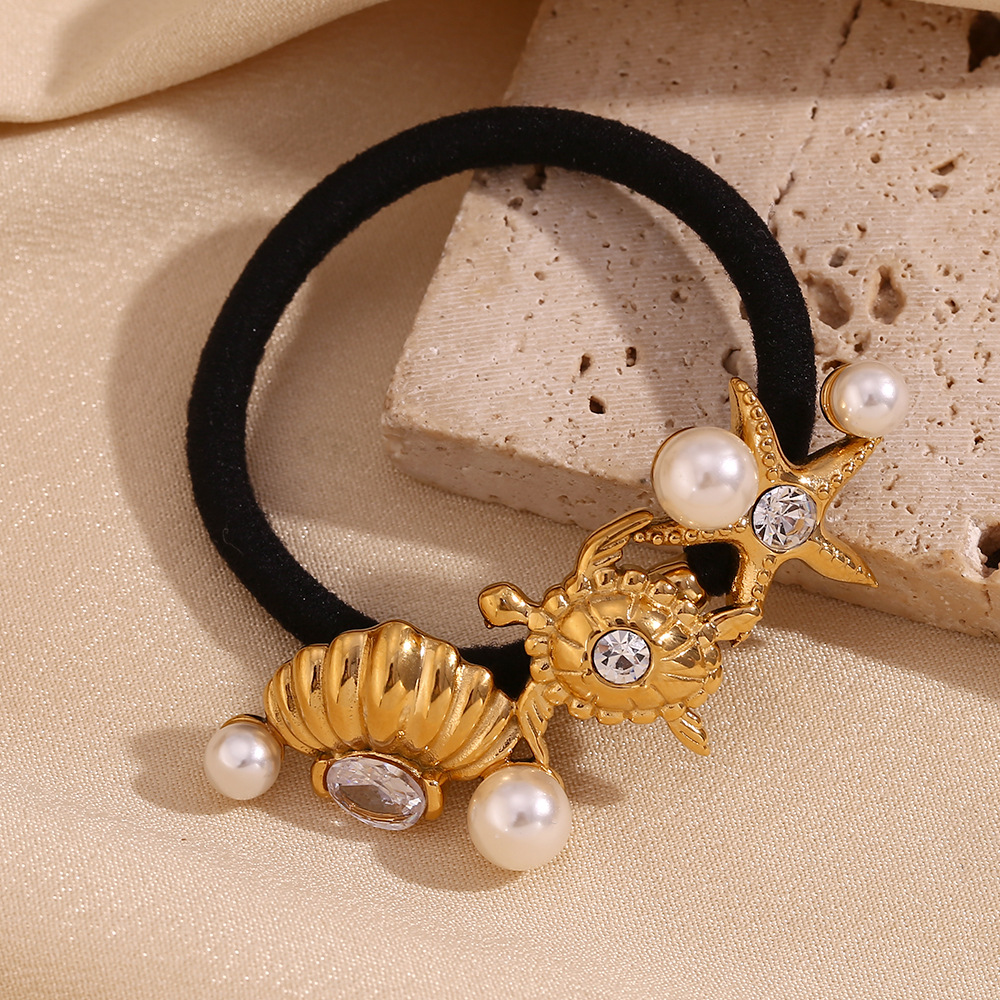 Trendy, niche design, popular and versatile stainless steel hair tie with 18K gold plating, featuring marine animal designs for women.
