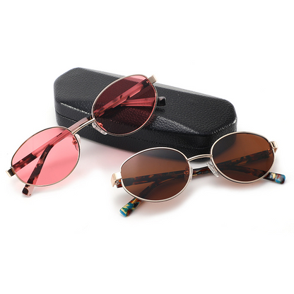 Women's stylish travel sunglasses with simple and versatile metal oval frames, UV protection, and polarized lenses.