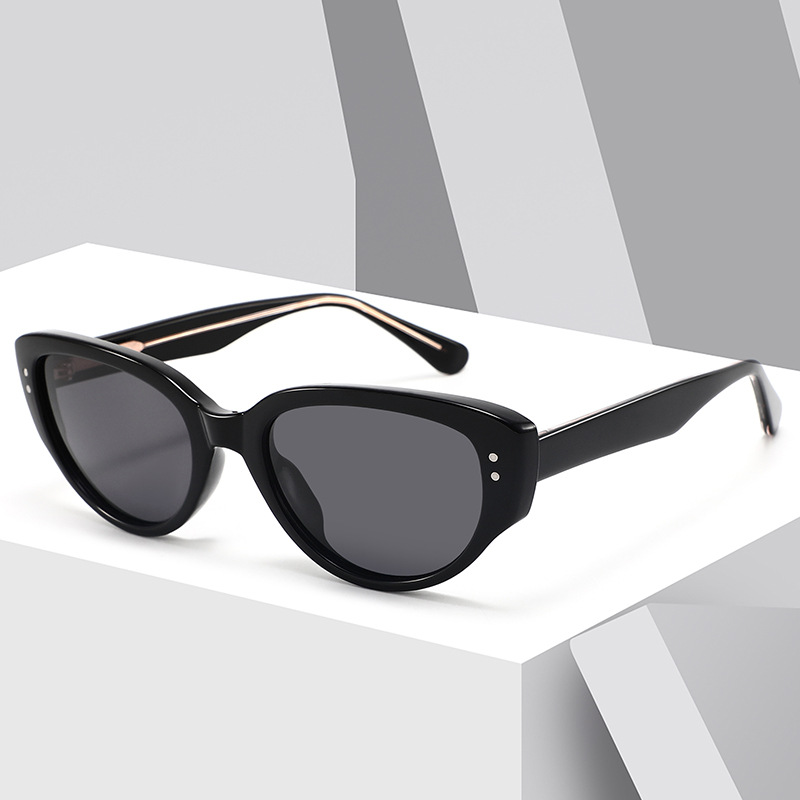 Women's stylish cat-eye sunglasses, TR90 frame, acetate temples, perfect for travel, UV protection.