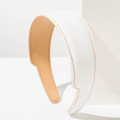 Simple, luxurious, and high-end leather headband for women; versatile, concave headband; wide-brimmed hair accessory for face washing and hair support.