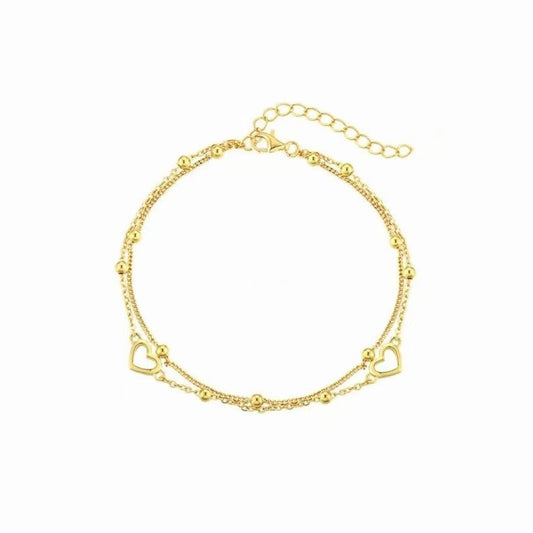 Double-layered, aloof in appearance, with bead-encrusted chains and an alloy heart-shaped bracelet