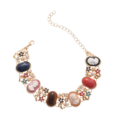 Colored bracelet with resin flower figurine inlaid with diamonds