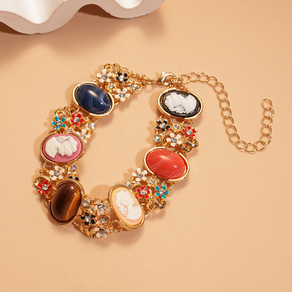 Colored bracelet with resin flower figurine inlaid with diamonds