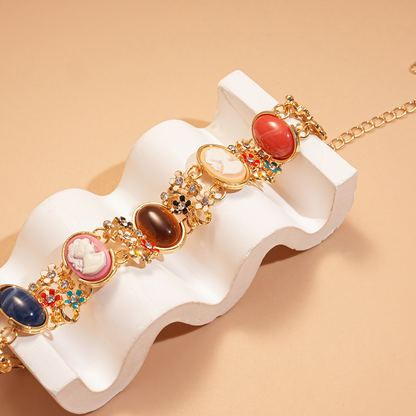 Colored bracelet with resin flower figurine inlaid with diamonds