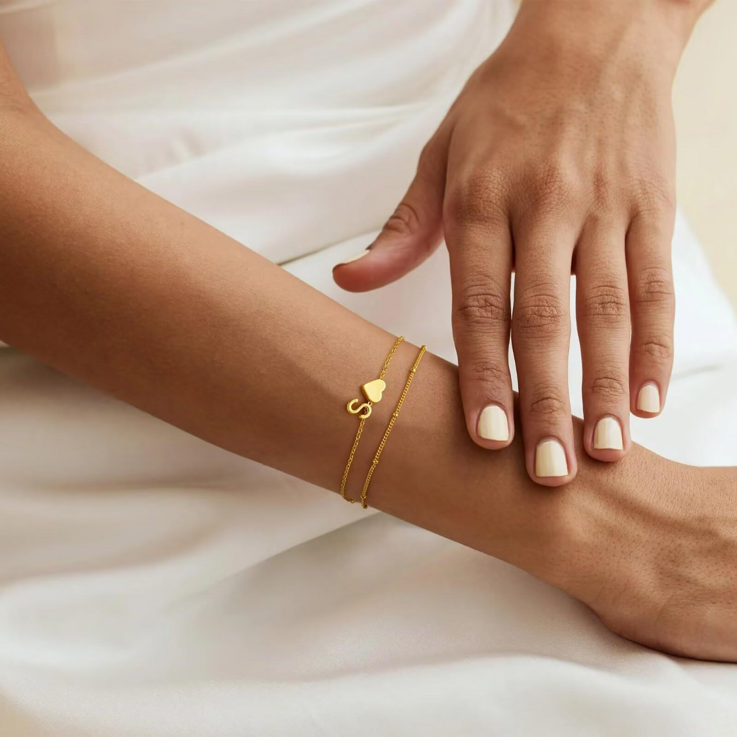 English alphabet bracelet for women, featuring a dual-layer heart-shaped pendant and expressing individuality and charm