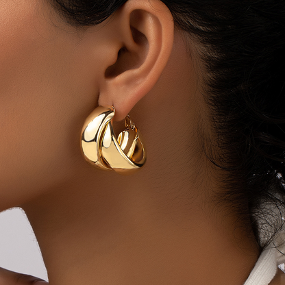 High-end design, unique round hoop earrings for women, simple and elegant, made of alloy, versatile.