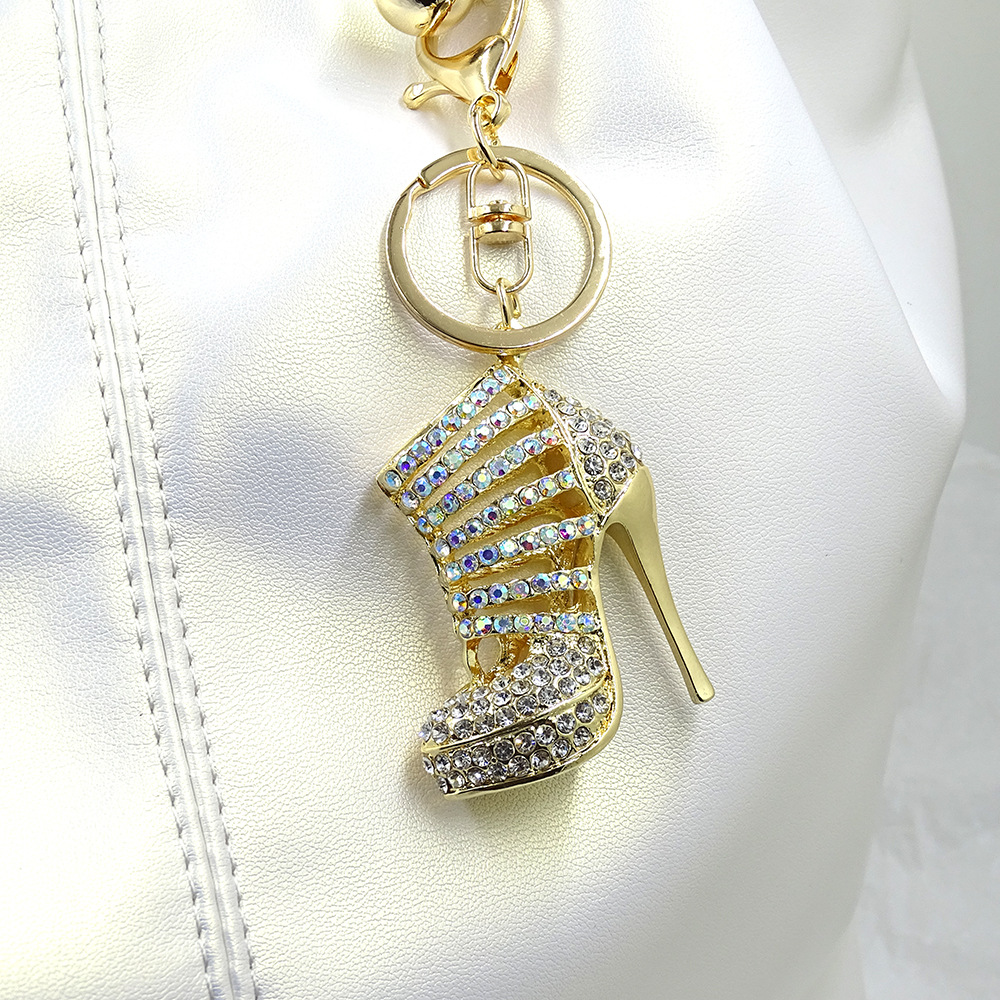 Three-dimensional, hollowed-out high heels; metal women's bag keychain