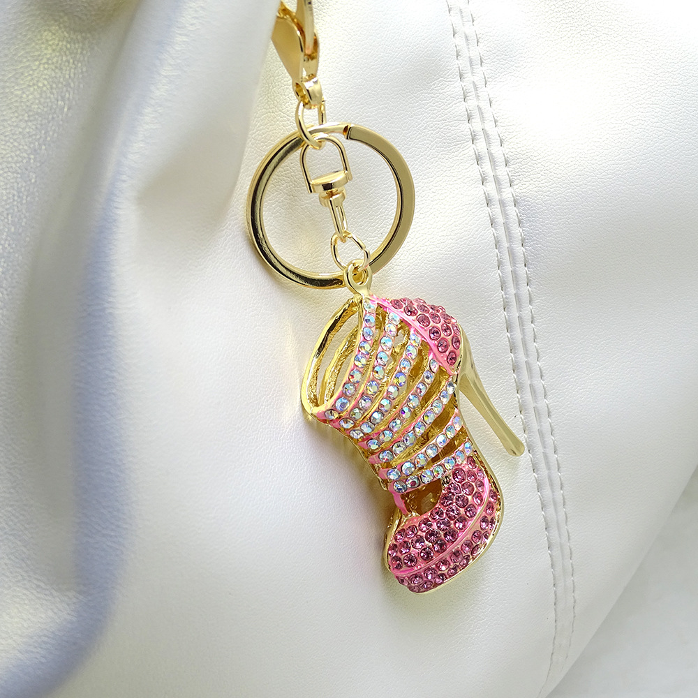 Three-dimensional, hollowed-out high heels; metal women's bag keychain