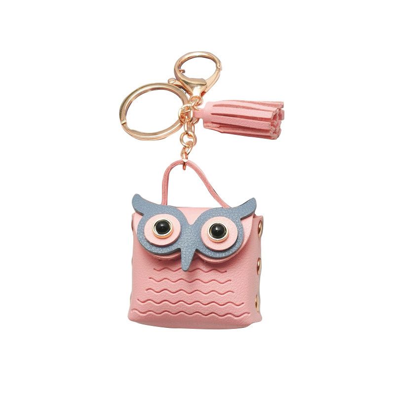 Mini keychain owl in a small pouch