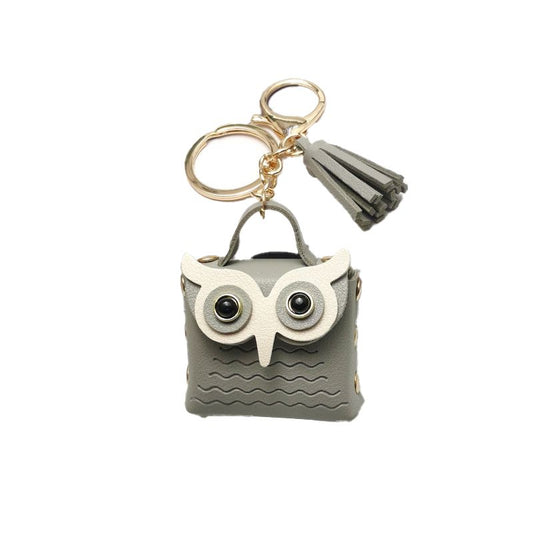 Mini keychain owl in a small pouch
