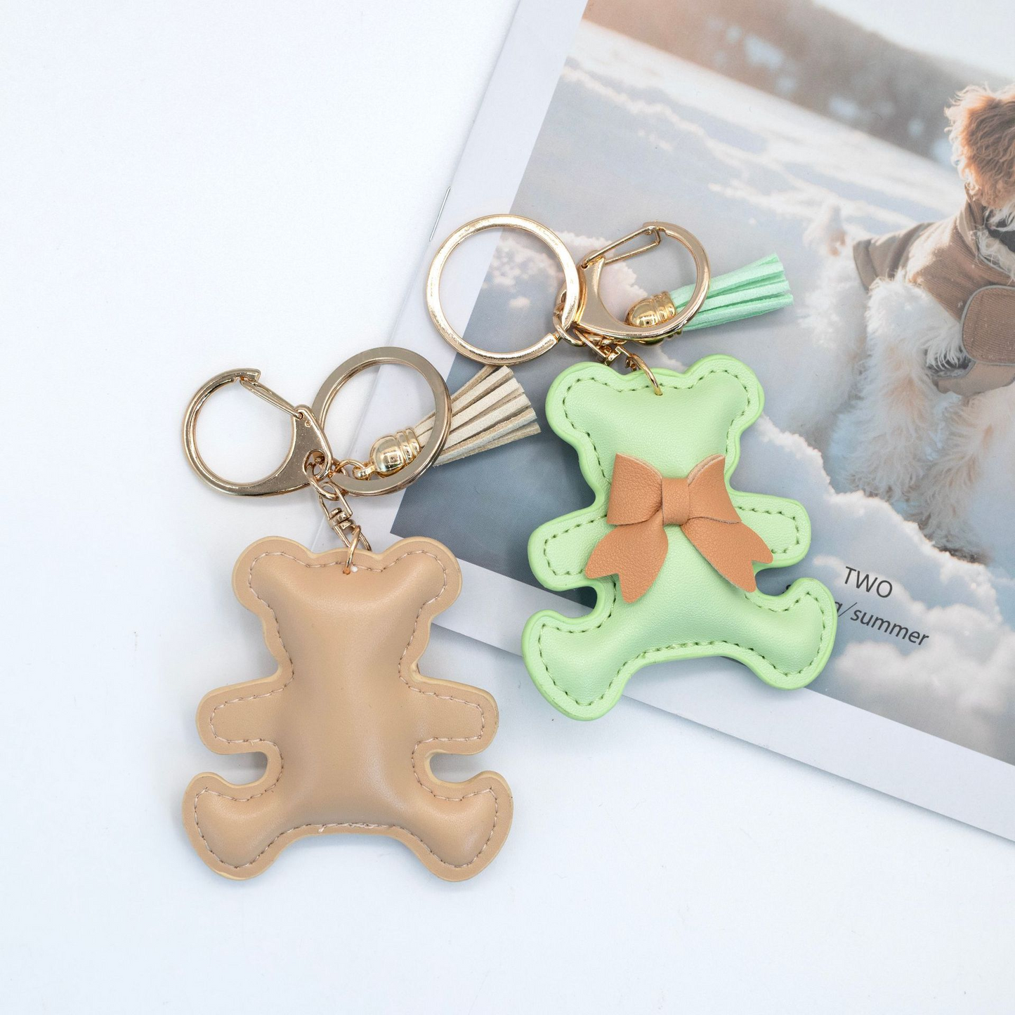Ribbon-patterned, multicolored bear-shaped PU leather keychain with padded interior