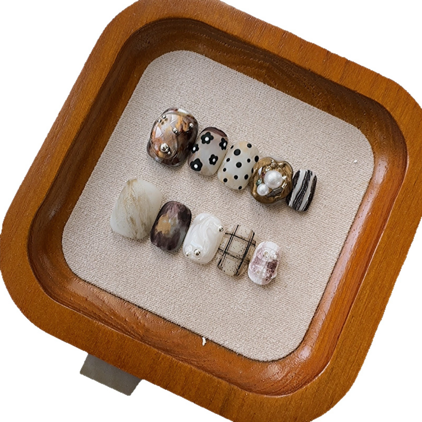 Artistic short-armored, matte, medieval-style nail set for wearing