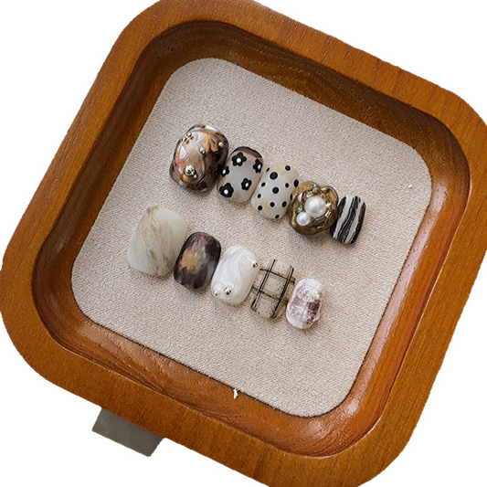 Artistic short-armored, matte, medieval-style nail set for wearing