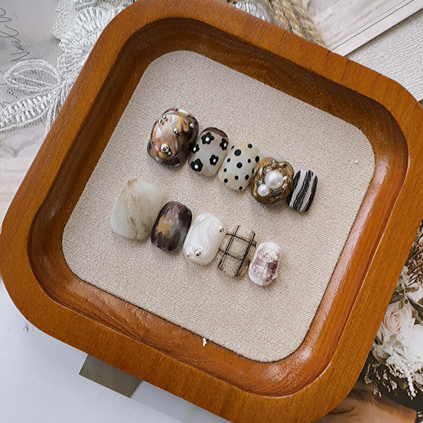 Artistic short-armored, matte, medieval-style nail set for wearing