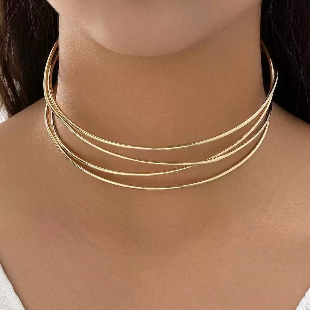 Gold-plated, multi-layered, cross-neck jewelry for women; elegant and simple openwork design.