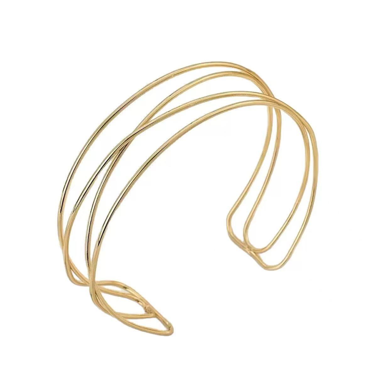 Gold-plated, multi-layered, cross-neck jewelry for women; elegant and simple openwork design.