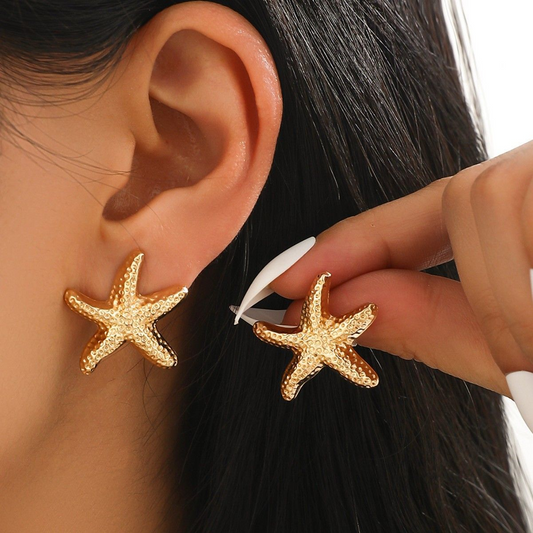 Starfish earrings, exaggerated and fashionable, featuring a simple starfish element, perfect for women.