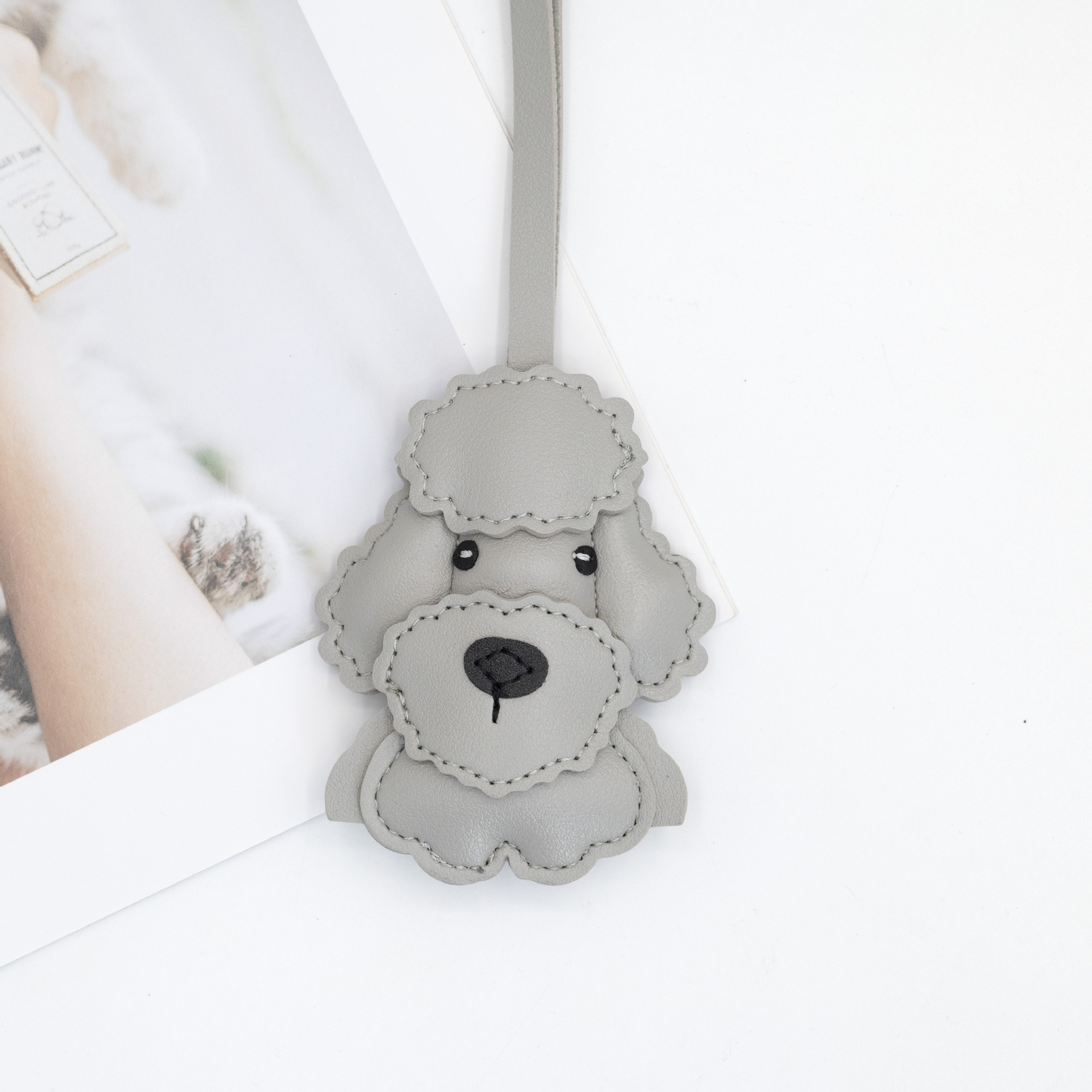 Cute cartoon-style leather bags and keychains in teddy bear design