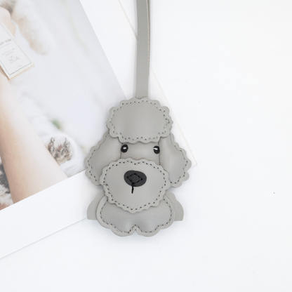 Cute cartoon-style leather bags and keychains in teddy bear design
