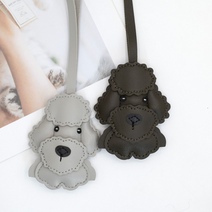 Cute cartoon-style leather bags and keychains in teddy bear design