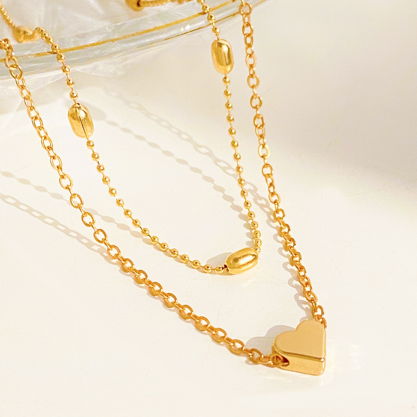 Beaded chain, multi-layered heart-shaped alloy design – a feminine beach shoe accessory