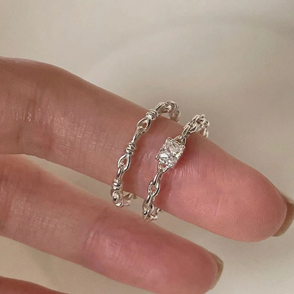 This ring features an adjustable design, making it suitable for those with thicker fingers. It is a delicate and stylish option, ideal for wearing on the index finger.