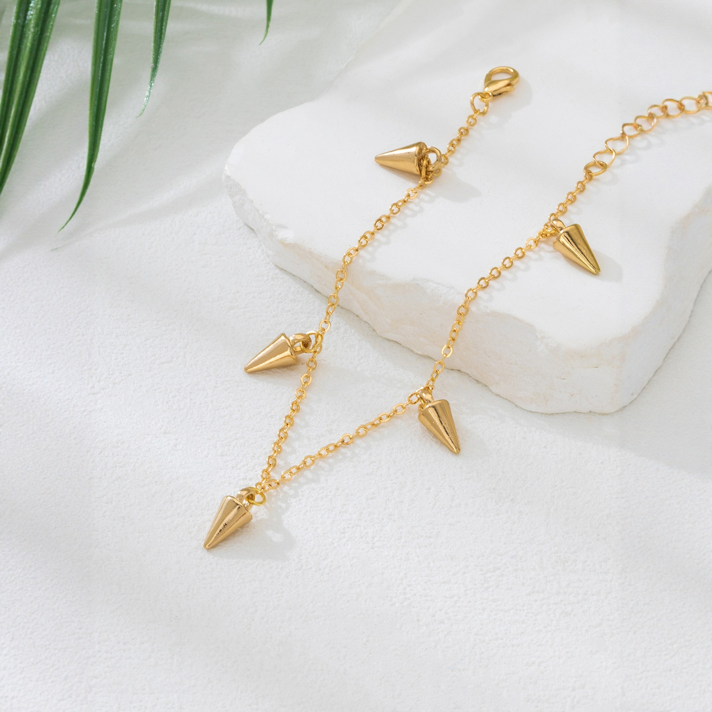 A stylish conical ankle bracelet for women