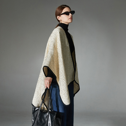 Woolen shawl with gold threads and a delicate fragrance
