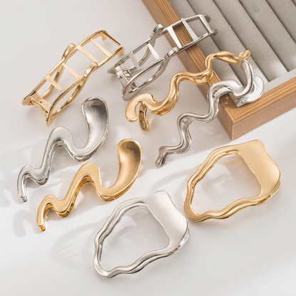 Trendy, unique, niche design, glossy/matte finish, irregular shape, shark clip, minimalist style, hair clip at the back of the head.