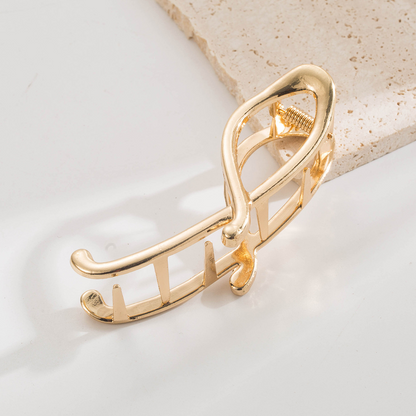 Trendy, unique, niche design, glossy/matte finish, irregular shape, shark clip, minimalist style, hair clip at the back of the head.