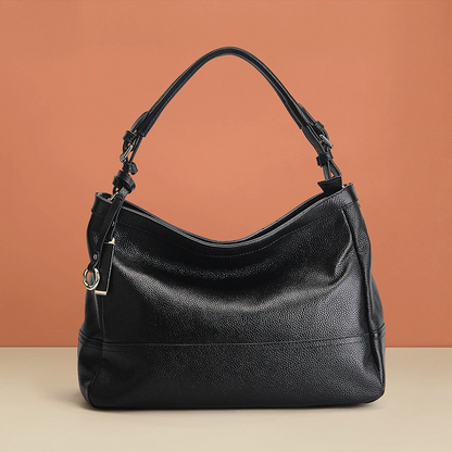 High-quality genuine leather fashion handbag for women, designed with a premium feel and ample capacity – a single-shoulder bag that can be carried under the arm.