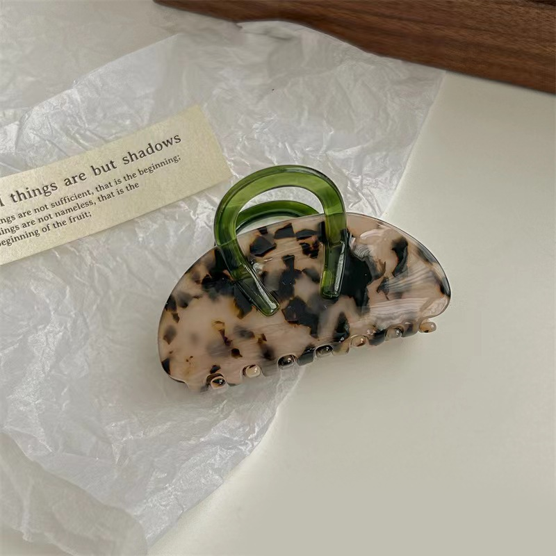 High-end acetate hair clip, shark clip at the back of a woman's head